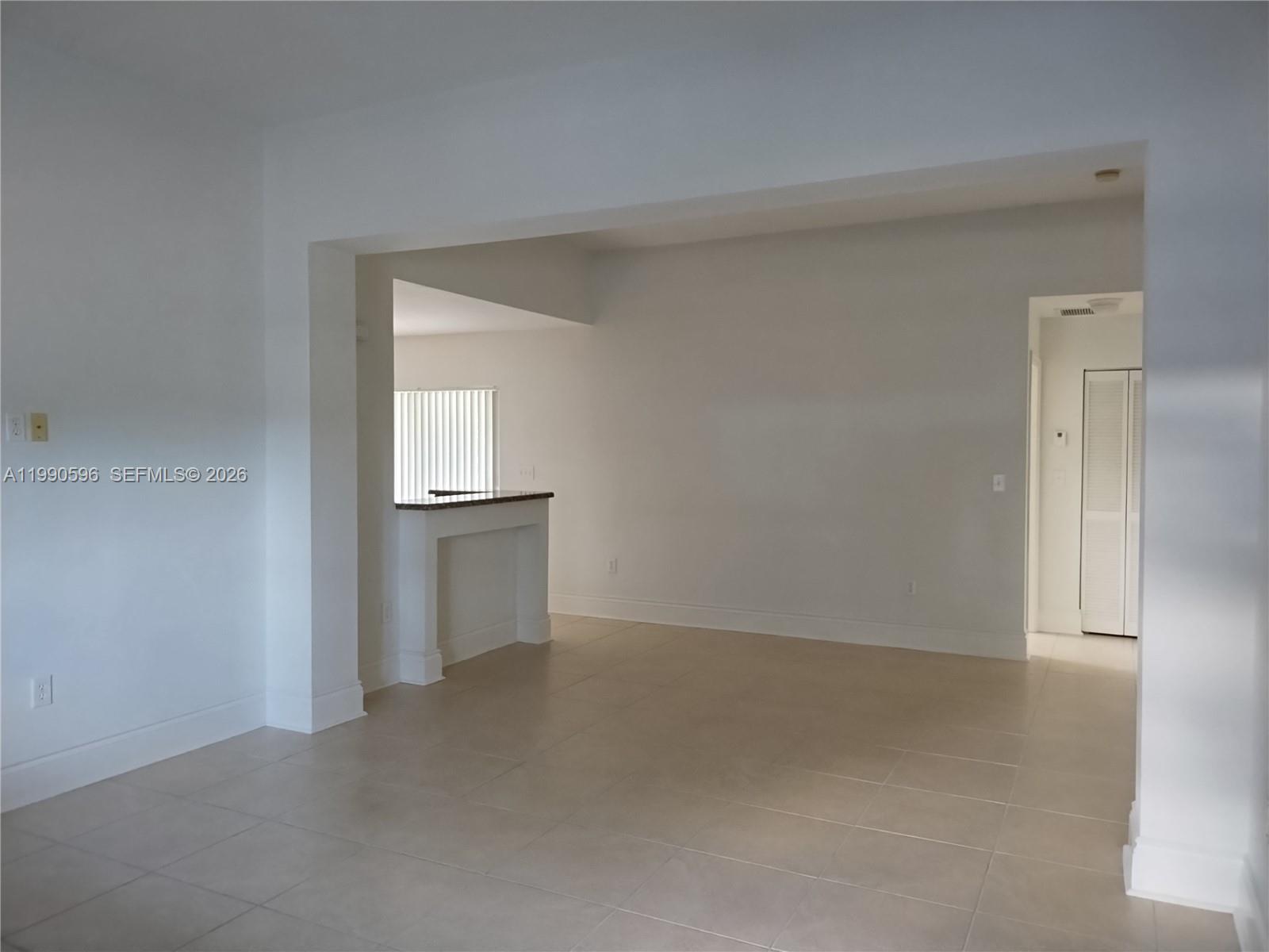 10169 Southwest 171st Street Miami, FL 33157 - Photo 15 of 33 Living-Dining Area