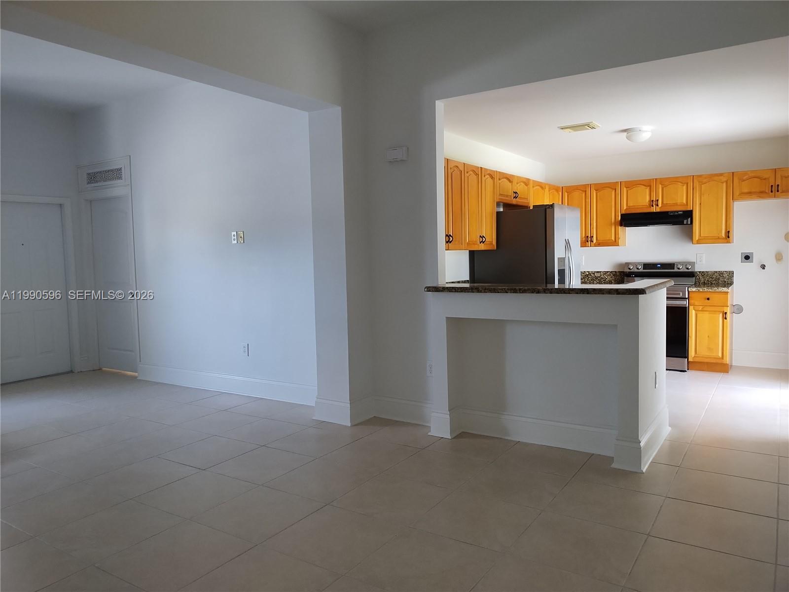 10169 Southwest 171st Street Miami, FL 33157 - Photo 16 of 33 Living-Dining Area