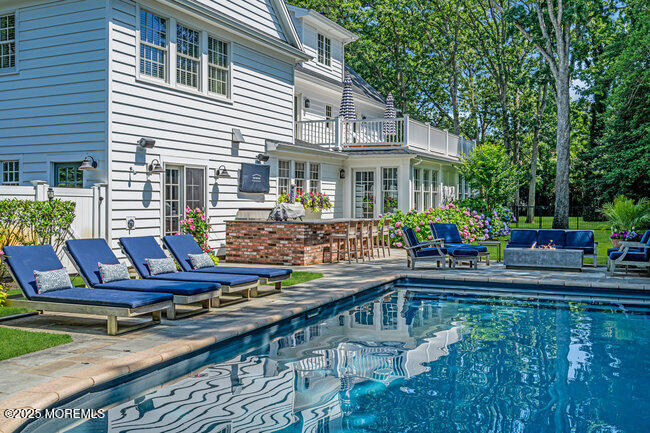 12 Red Oak Drive Spring Lake, NJ 07762 - Photo 19 of 79 a view of a house with backyard and sitting area