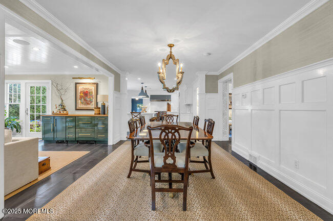 12 Red Oak Drive Spring Lake, NJ 07762 - Photo 41 of 79 a view of a dining room with furniture and a chandelier