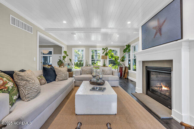 12 Red Oak Drive Spring Lake, NJ 07762 - Photo 45 of 79 a living room with furniture and a fireplace