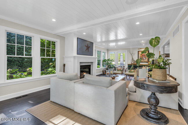 12 Red Oak Drive Spring Lake, NJ 07762 - Photo 47 of 79 a living room with furniture and a fireplace