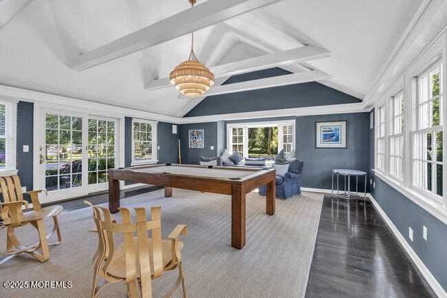 12 Red Oak Drive Spring Lake, NJ 07762 - Photo 54 of 79 a dining room with wooden floor a chandelier a glass table and chairs