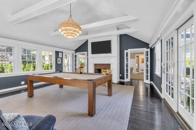 12 Red Oak Drive Spring Lake, NJ 07762 - Photo 56 of 79 a living room with fireplace furniture and a wooden floor