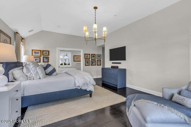 12 Red Oak Drive Spring Lake, NJ 07762 - Photo 64 of 79 a spacious bedroom with a bed and a flat screen tv