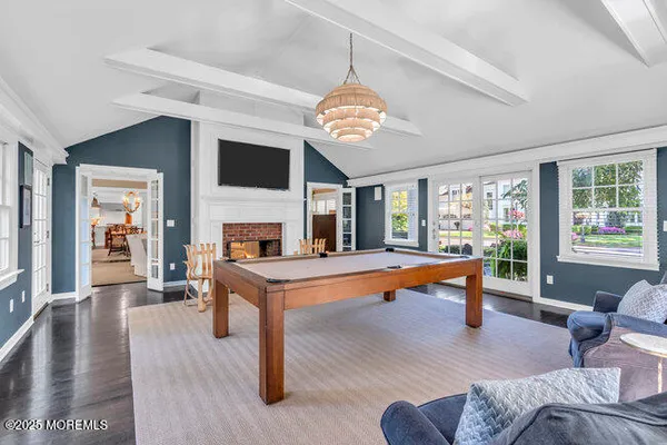 a spacious bedroom with a large bed and a window