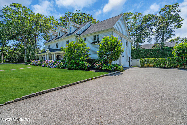 12 Red Oak Drive Spring Lake, NJ 07762 - Photo 7 of 79 a view of a house with a garden