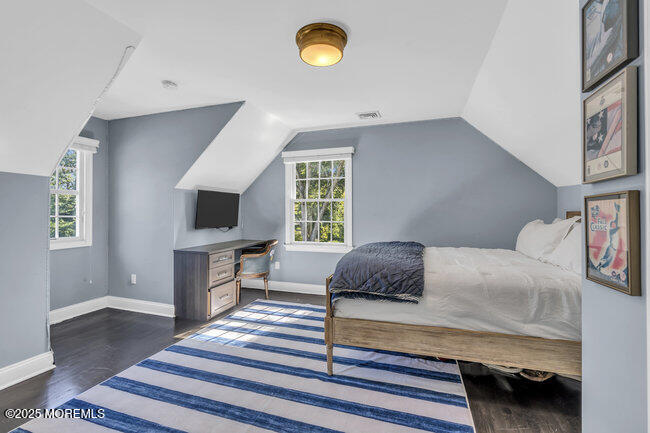 12 Red Oak Drive Spring Lake, NJ 07762 - Photo 77 of 79 a bedroom with a bed and a flat screen tv