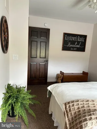 a outdoor living space with furniture and garden view