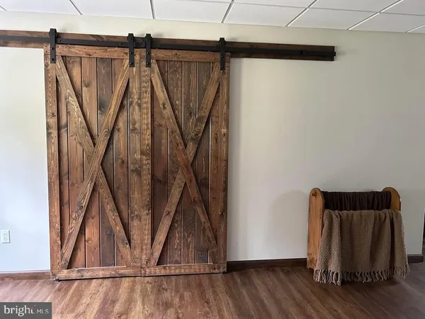 a view of a chair and table in the balcony
