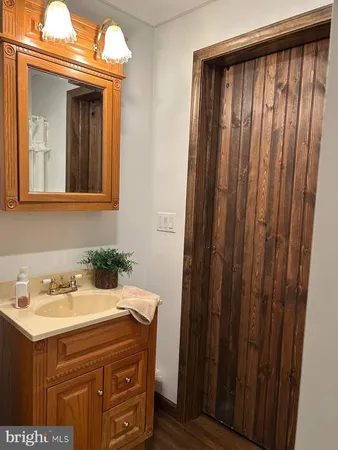 a view of a table and chairs in the garden