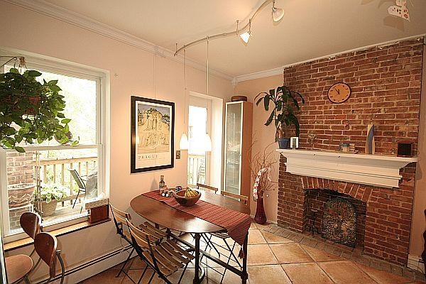 208 3rd Street Hoboken, NJ 07030 - Photo 3 of 22 a view of a dining room with furniture window and outside view