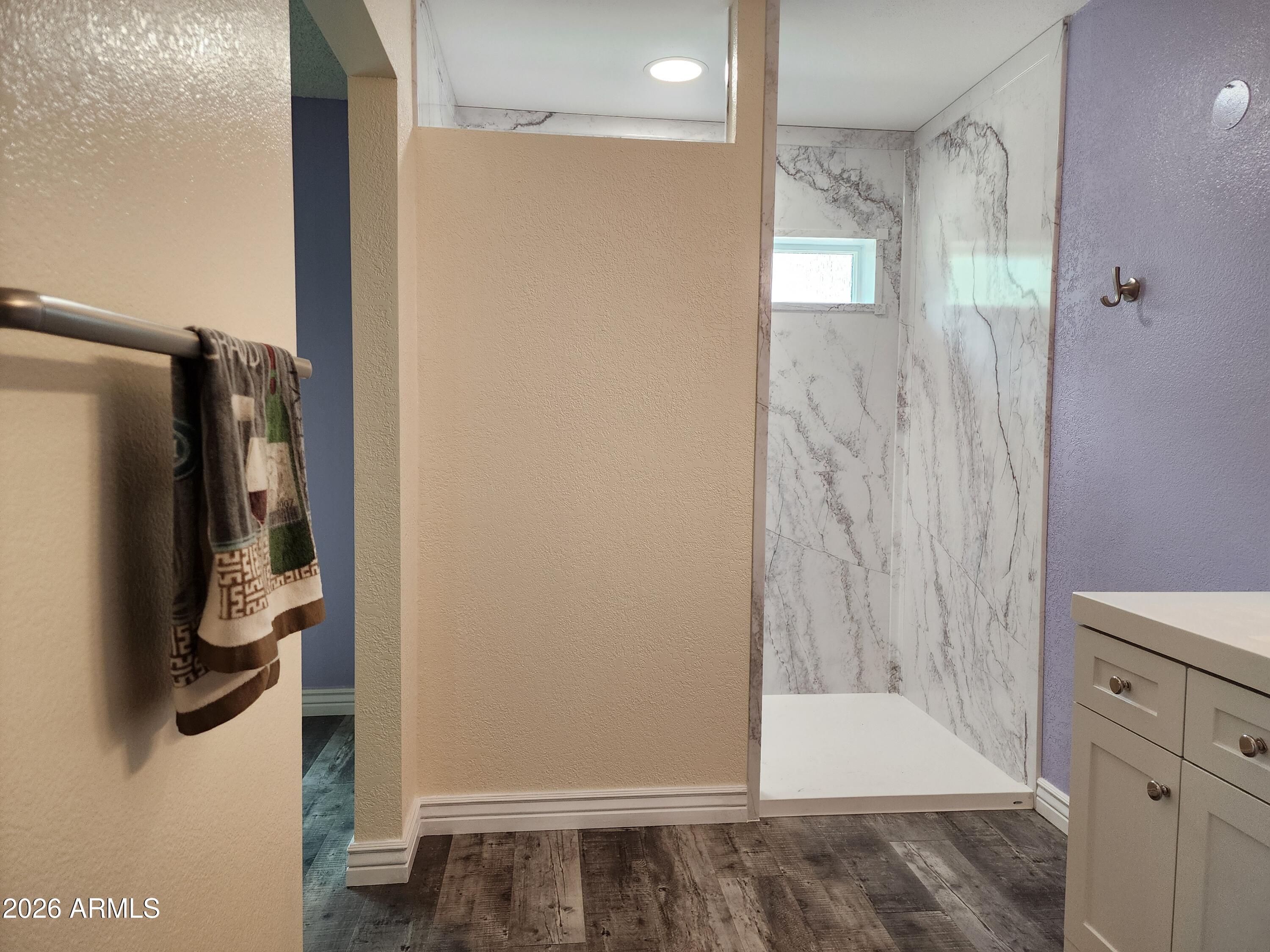 8708 West Ruth Avenue Peoria, AZ 85345 - Photo 12 of 28 Primary bath shower