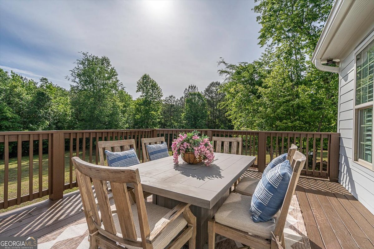 3093 Surry Ridge Drive Watkinsville, GA 30677 - Photo 34 of 41 a view of a chairs and table on the deck