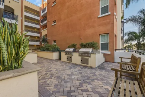 a view of a chairs and table in the patio