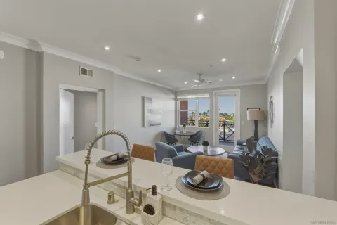 a room with furniture and a potted plant