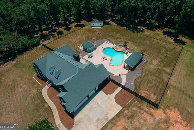 a bathroom with a tub and a window