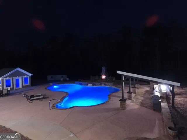 a kitchen with lots of counter space and appliances