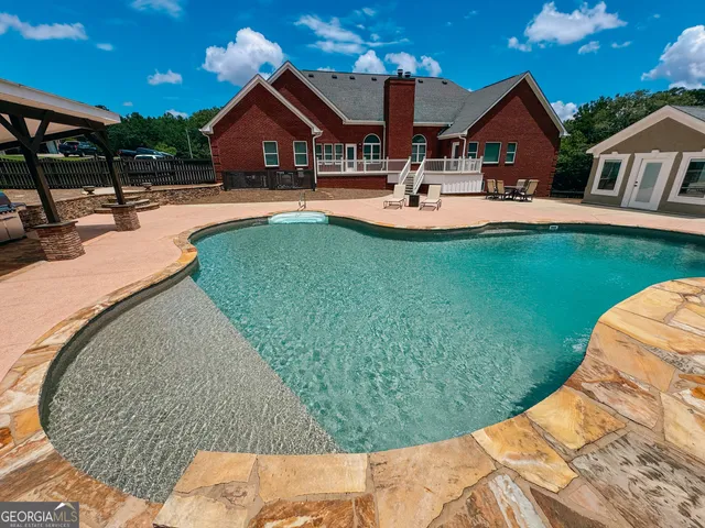 a view of a house with a big yard
