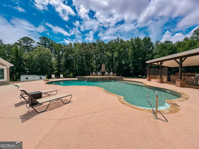 a room with gym equipment and a large window
