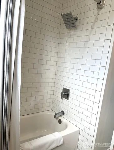 a bathroom with a bathtub