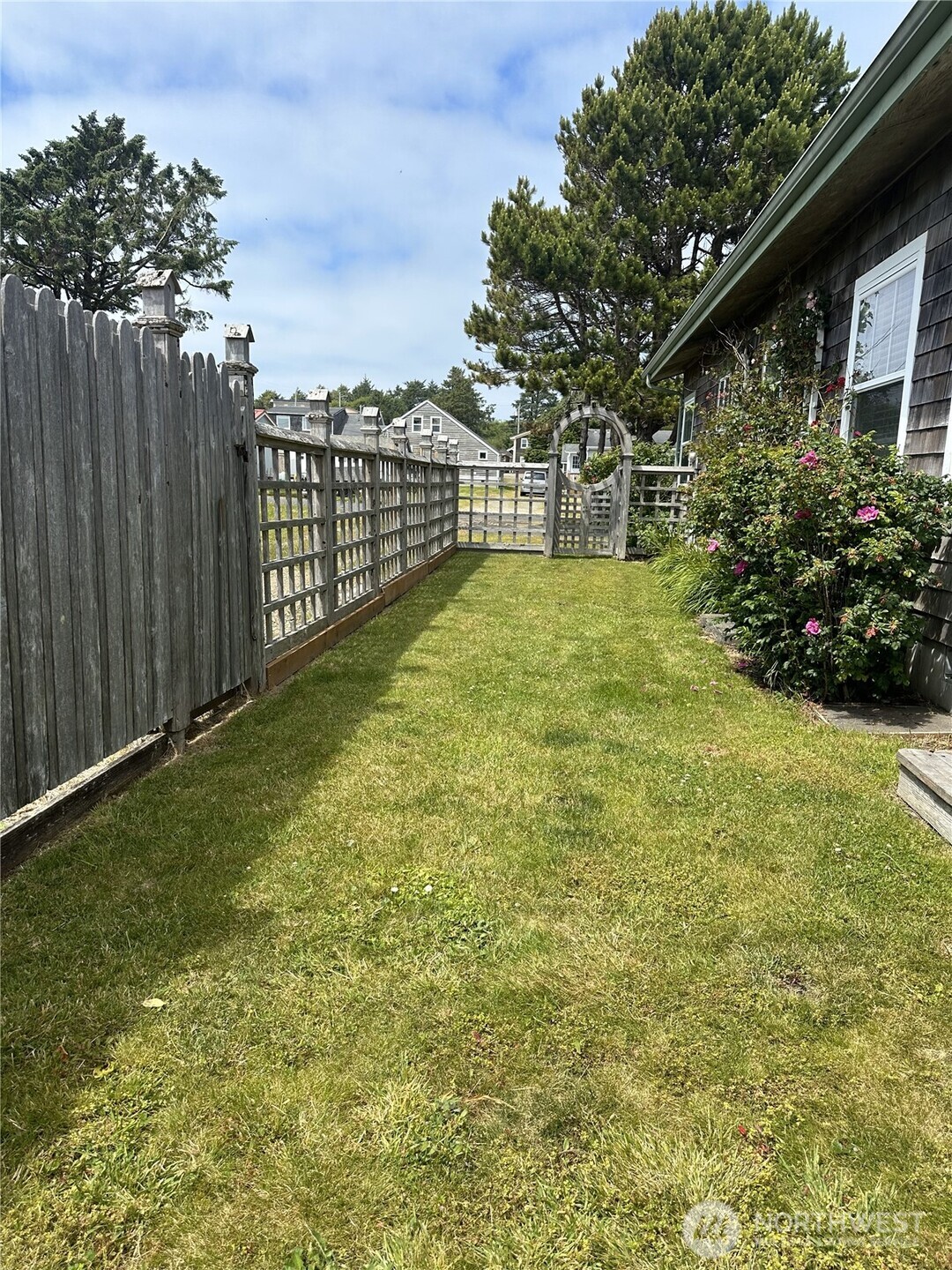 45 Central Avenue Pacific Beach, WA 98571 - Photo 17 of 28 a view of a backyard