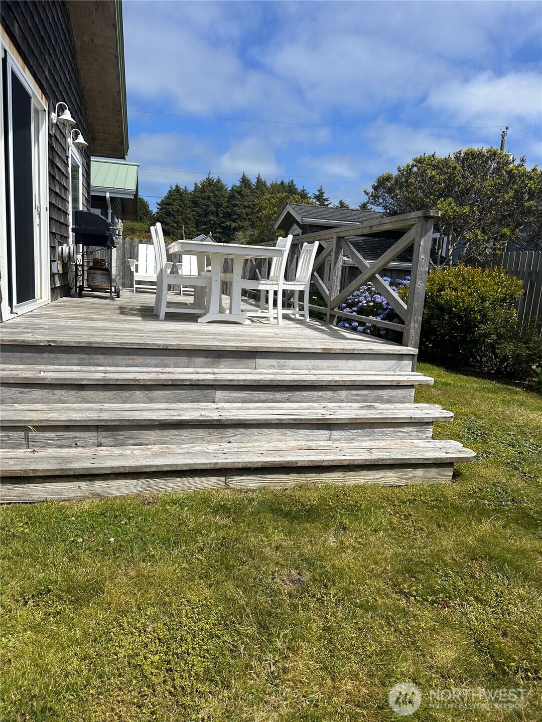 45 Central Avenue Pacific Beach, WA 98571 - Photo 19 of 28 a view of a fountain in front of a house