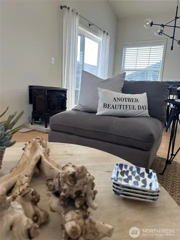 a living room with furniture and a window