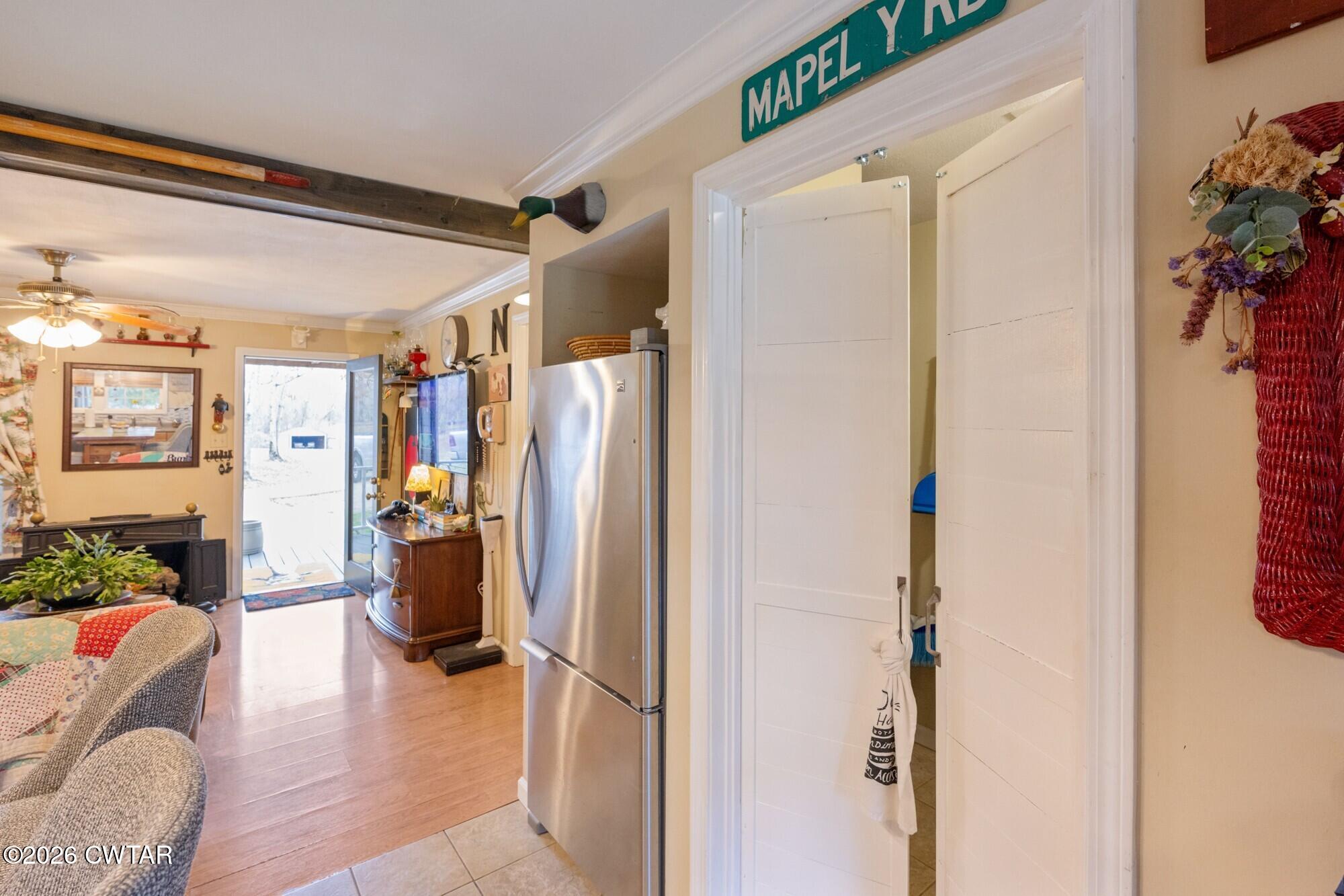 2108 Bohannon Landing Road Sugar Tree, TN 38380 - Photo 11 of 57 a view of a livingroom with furniture and front door