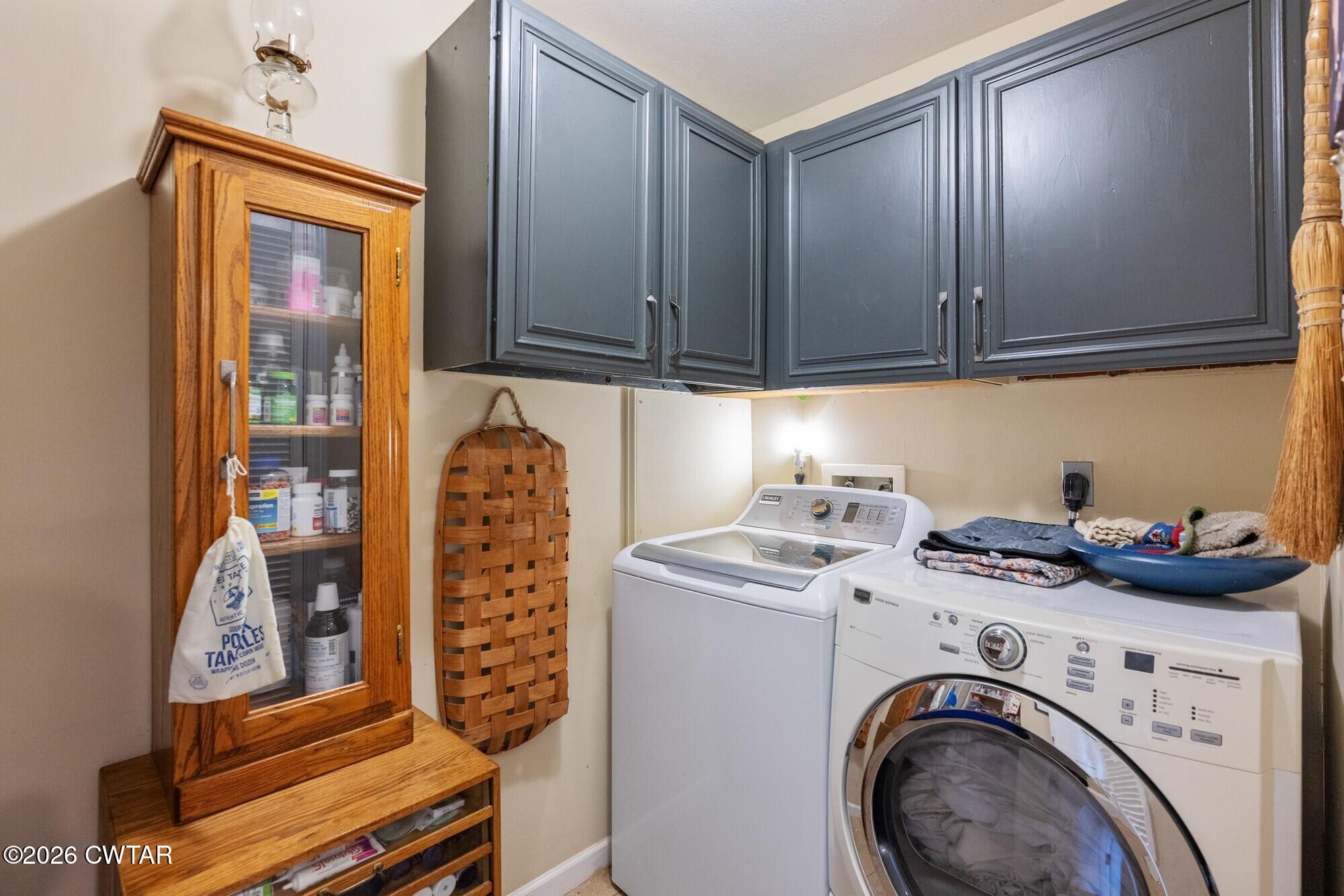 2108 Bohannon Landing Road Sugar Tree, TN 38380 - Photo 12 of 57 a utility room with dryer and washer