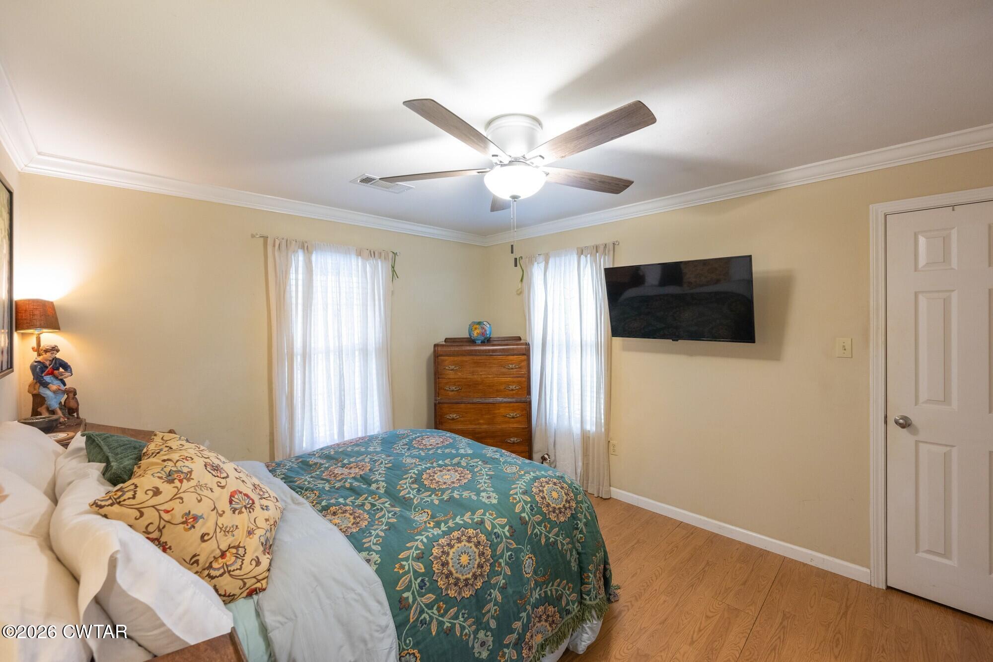 2108 Bohannon Landing Road Sugar Tree, TN 38380 - Photo 18 of 57 a bedroom with a bed and a television