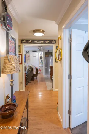 a view of a yard with a tree