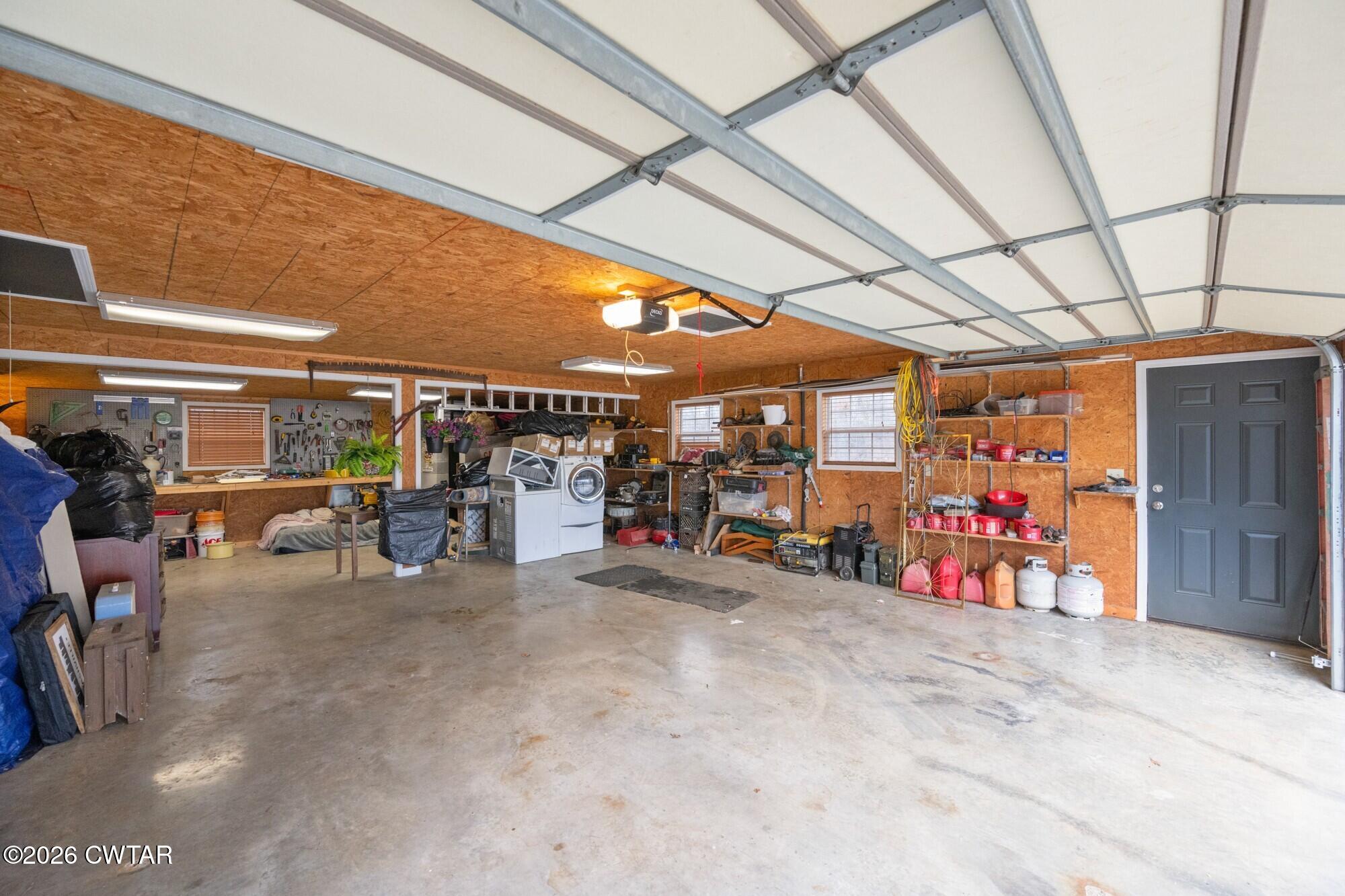 2108 Bohannon Landing Road Sugar Tree, TN 38380 - Photo 35 of 57 a view of a garage with a table and chairs