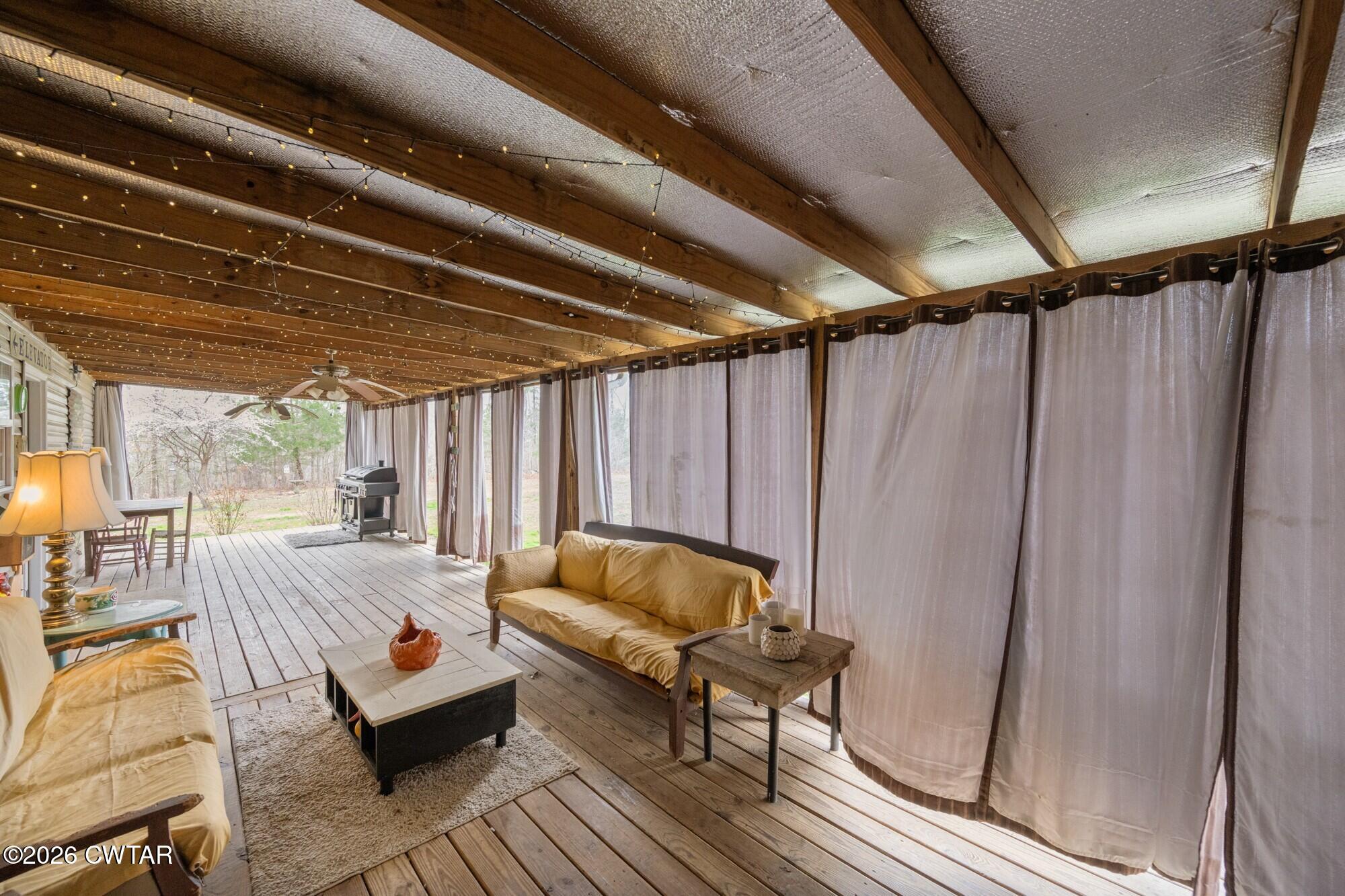 2108 Bohannon Landing Road Sugar Tree, TN 38380 - Photo 40 of 57 a bed room with furniture and a couch