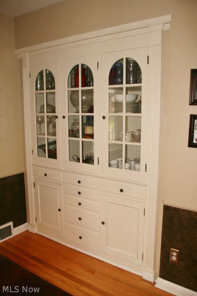 2452 Dysart Road Cleveland, OH 44118 - Photo 5 of 22 Detailed view of the wonderful built-in china cabinet complete with shelves, cabinets and drawers providing incredible storage & display.