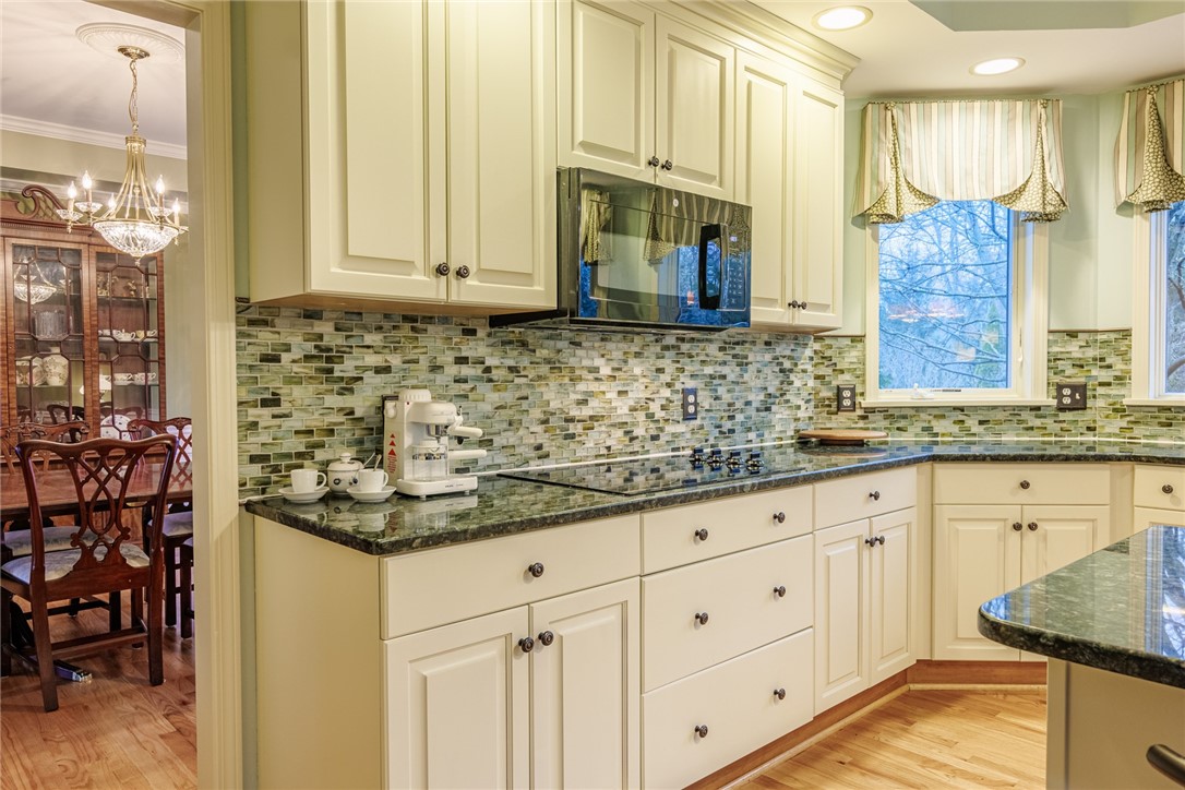 31 St Ebba's Drive Penfield, NY 14526 - Photo 12 of 49 Handmade glass tile backsplash!