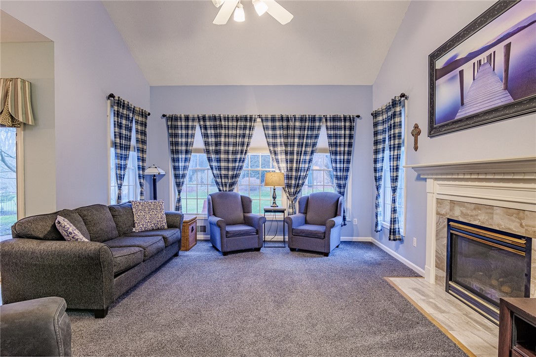 31 St Ebba's Drive Penfield, NY 14526 - Photo 19 of 49 Oversized windows, gas fireplace, this room is a d