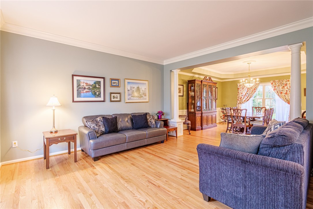 31 St Ebba's Drive Penfield, NY 14526 - Photo 8 of 49 1st of 2 Living Spaces, showings REFINISHED HARDWO