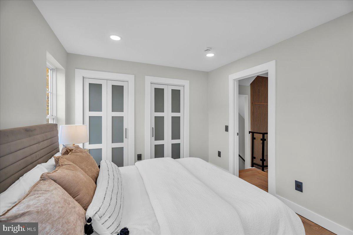 1227 Clymer Street Philadelphia, PA 19147 - Photo 17 of 37 a bedroom with a bed and a window