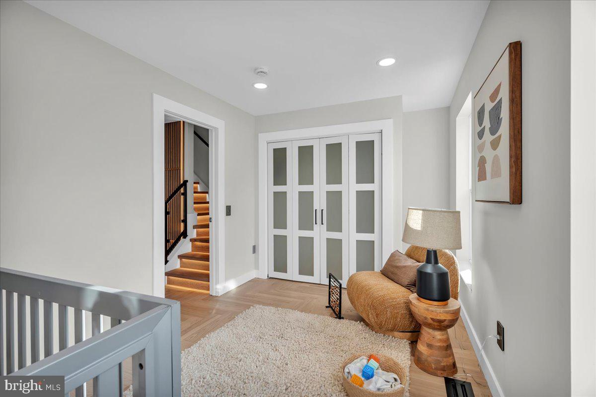 1227 Clymer Street Philadelphia, PA 19147 - Photo 20 of 37 a bedroom with furniture and a window