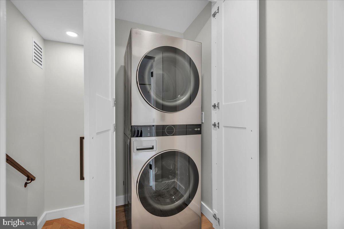 1227 Clymer Street Philadelphia, PA 19147 - Photo 28 of 37 a view of a hallway with washer and dryer