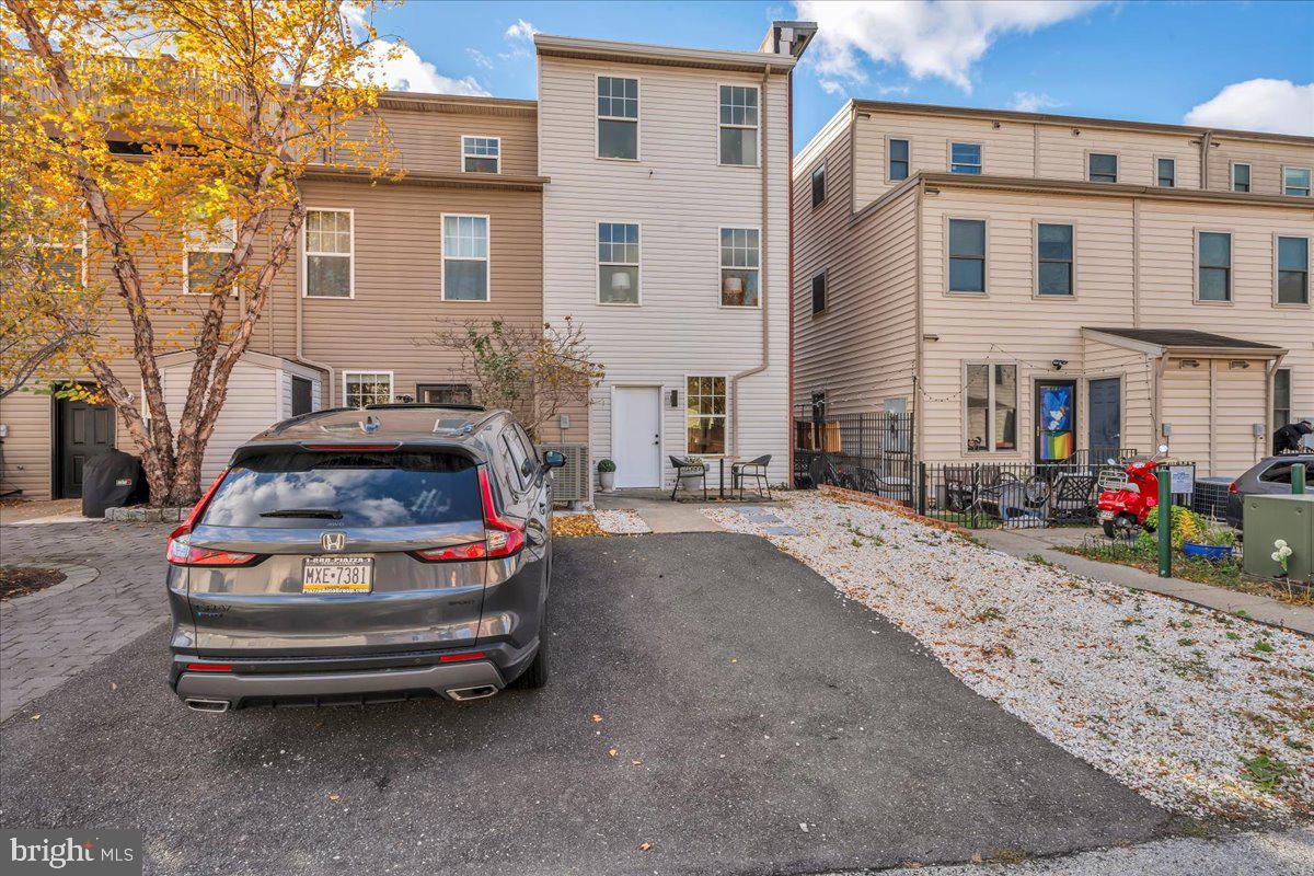 1227 Clymer Street Philadelphia, PA 19147 - Photo 30 of 37 a car parked in front of a house