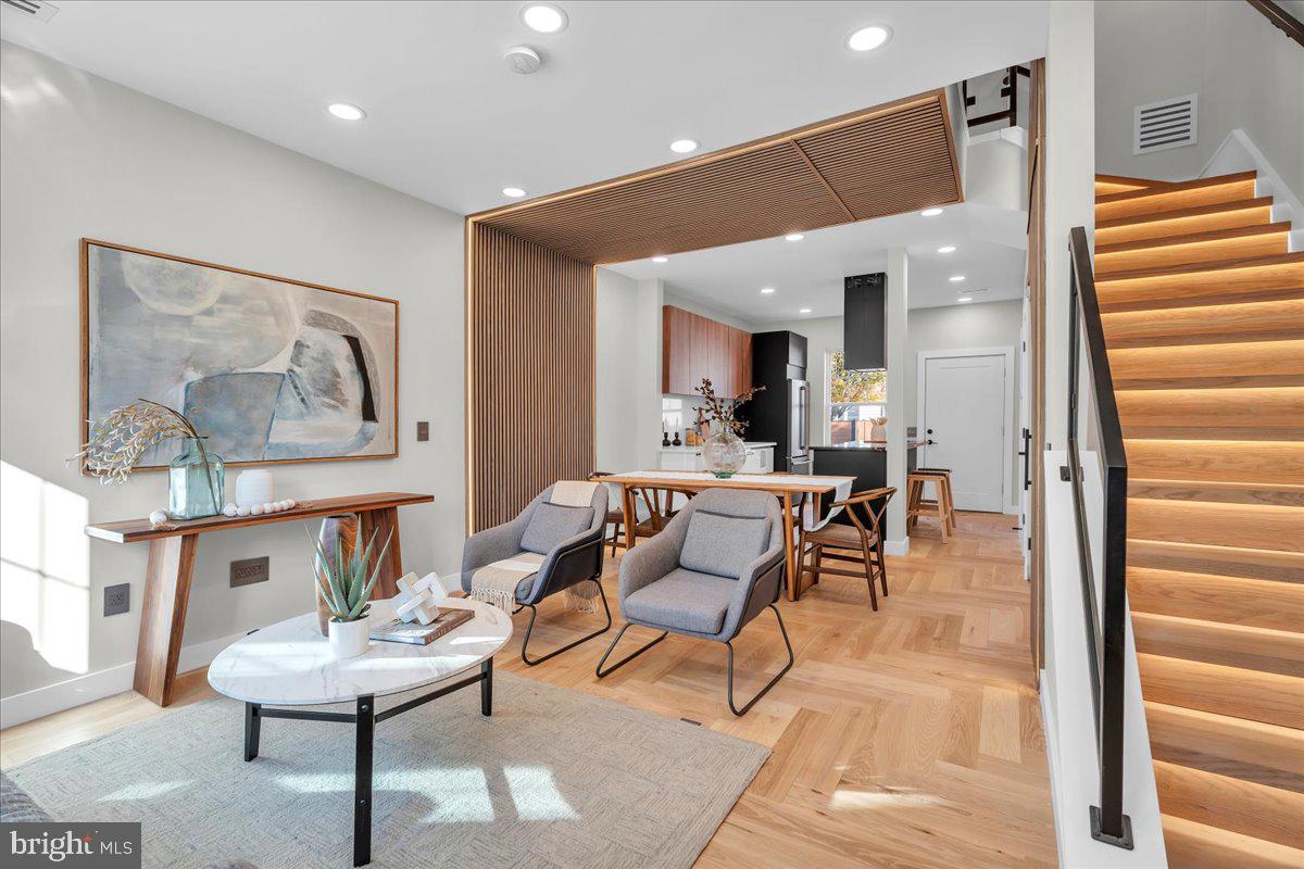 1227 Clymer Street Philadelphia, PA 19147 - Photo 5 of 37 a living room with furniture and a painting