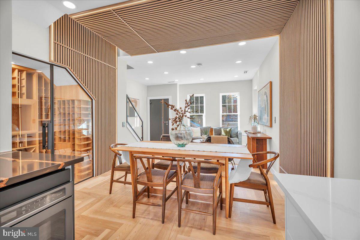 1227 Clymer Street Philadelphia, PA 19147 - Photo 6 of 37 a dining room with furniture and large windows