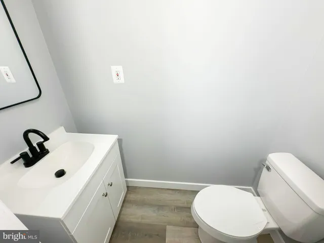 a bathroom with a toilet sink and a bathtub