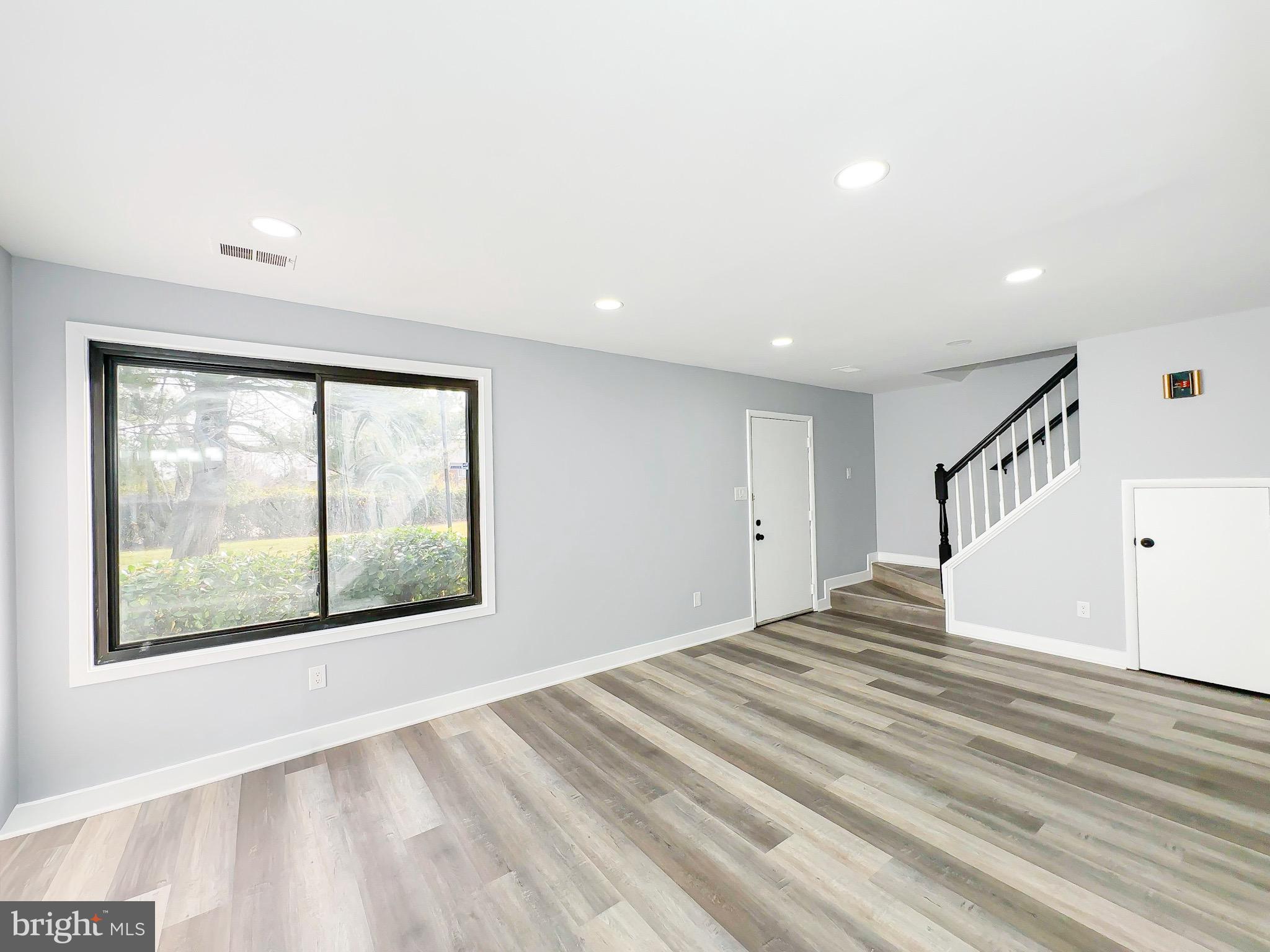 10167 Scotch Hill Drive, Unit 283 Upper Marlboro, MD 20774 - Photo 4 of 22 a view of an empty room with a window