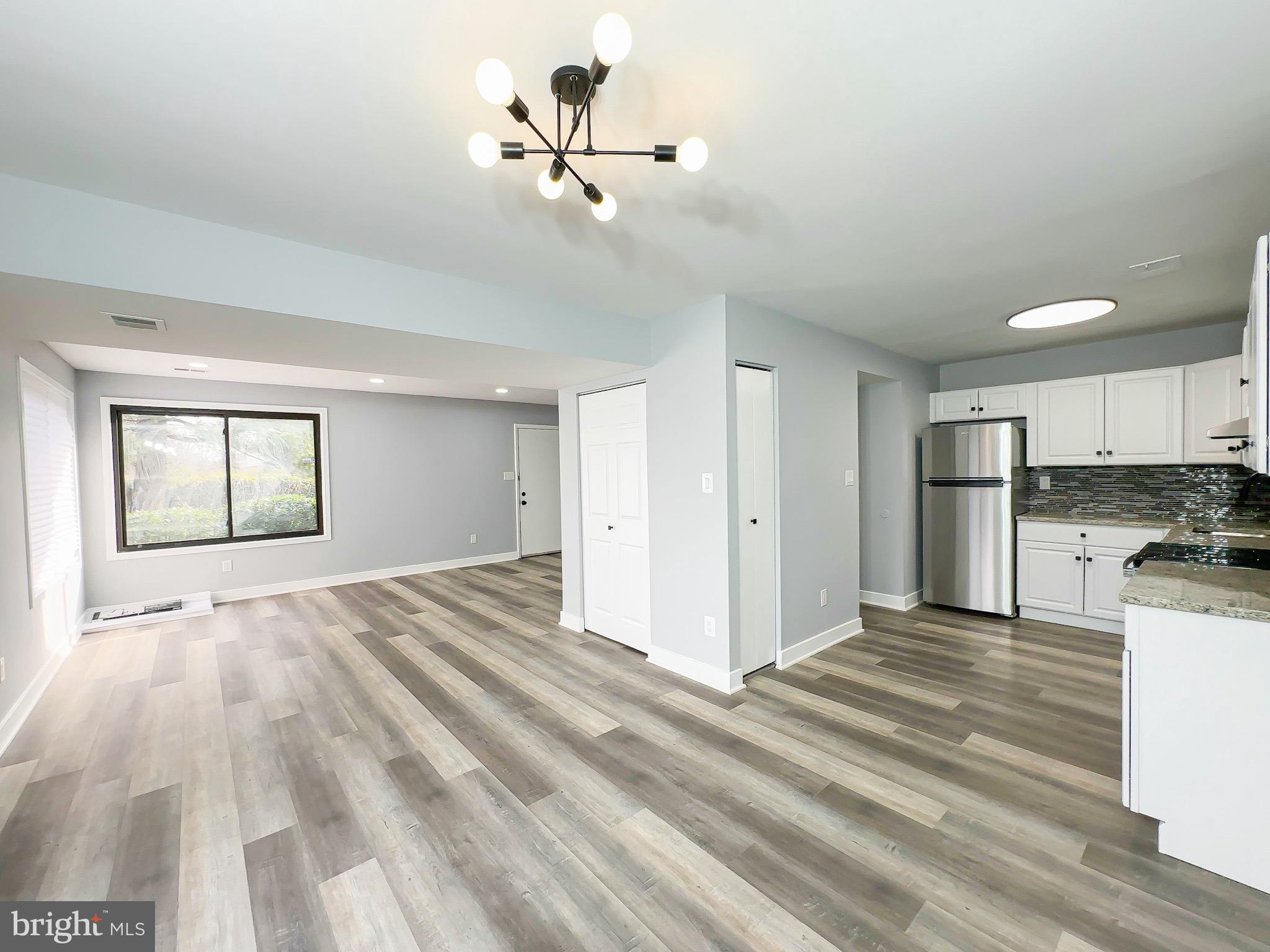 10167 Scotch Hill Drive, Unit 283 Upper Marlboro, MD 20774 - Photo 8 of 22 a view of a kitchen with a sink and cabinets