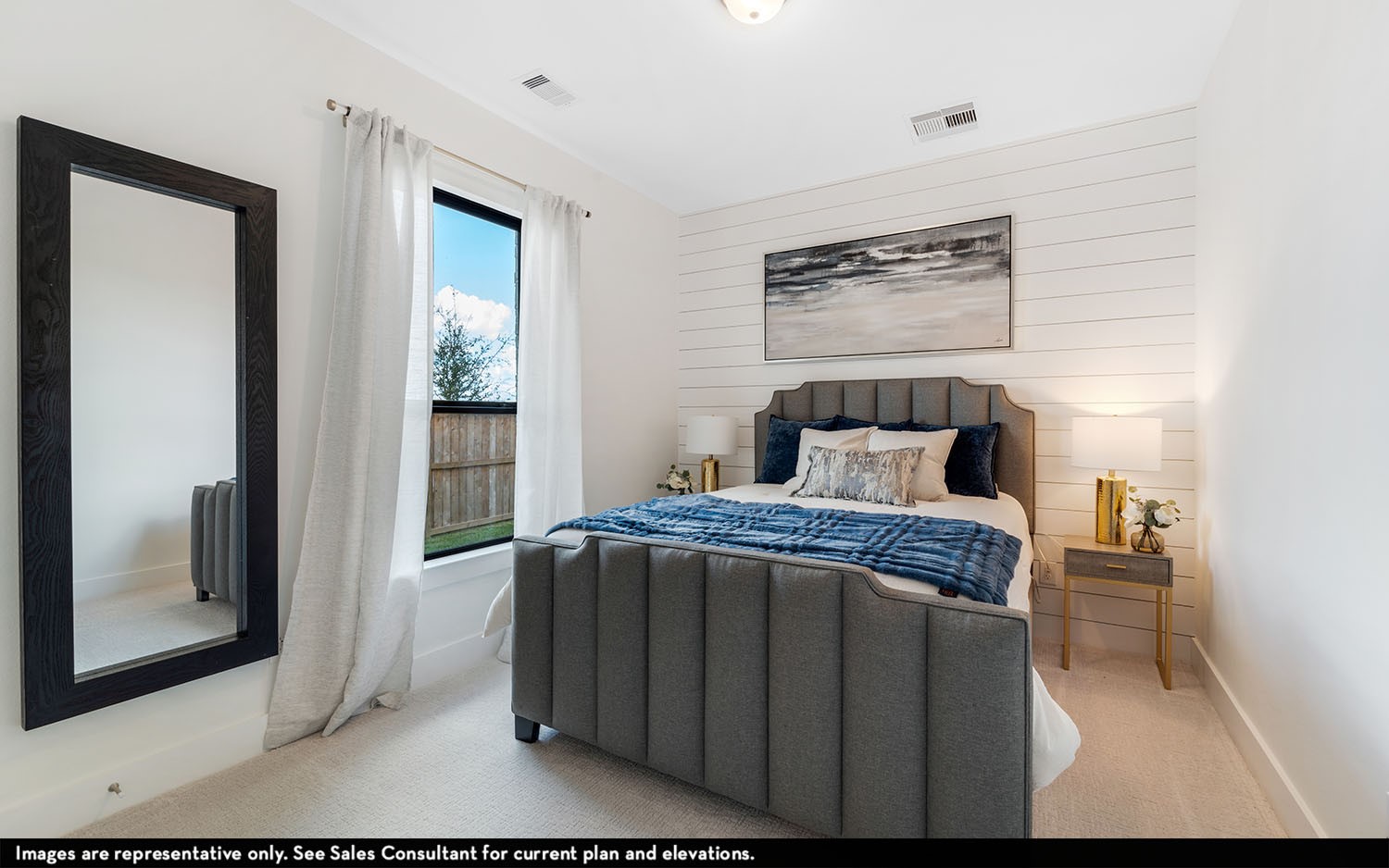 7910 Jasper Meadows Angleton, TX 77515 - Photo 20 of 31 a bedroom with a bed and wooden floor