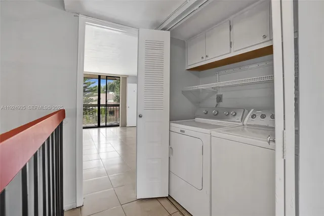 a view of an empty room with glass door