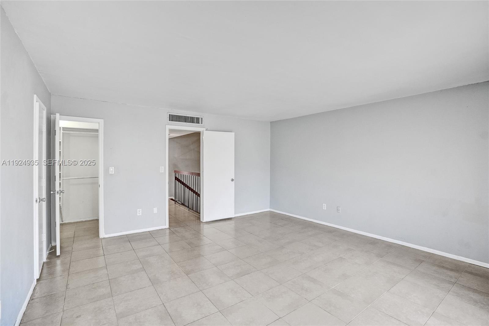 20607 Northeast 7th Court Miami, FL 33179 - Photo 22 of 49 an empty room with a bathroom